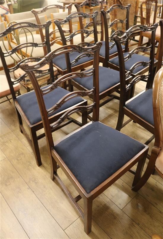 A set of eight George III style ladderback dining chairs